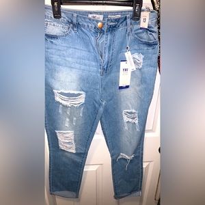 Distressed denim jeans